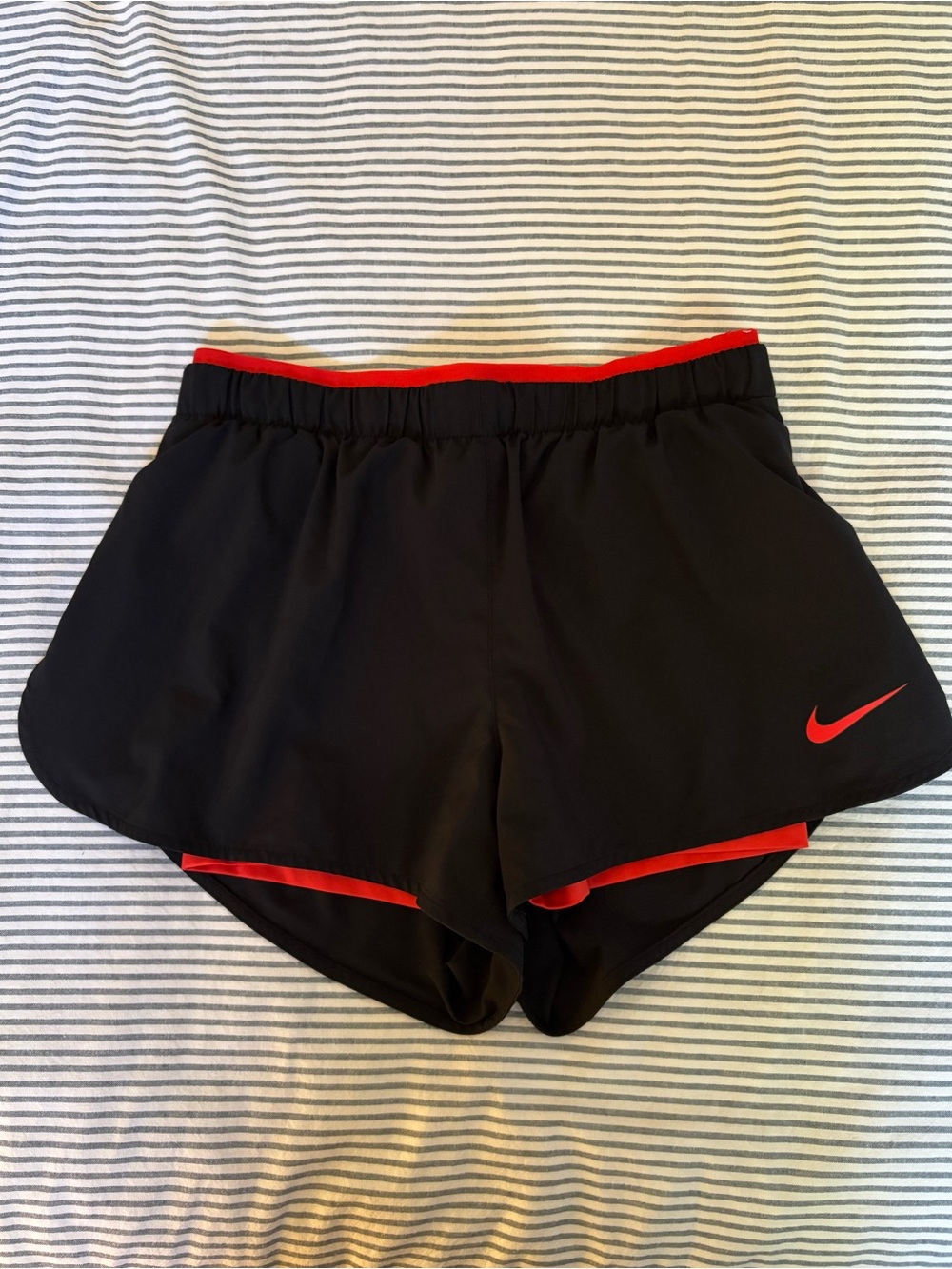 Nike Women’s Black Athletic Shorts with Red Accents